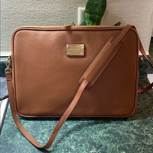 Michael Kors MacBook Pro crossbody sleeve case.